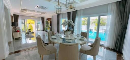 Luxurious dining room with pool view