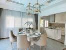 Bright dining area with elegant table and chairs, adjacent to modern kitchen