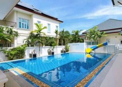 Outdoor swimming pool with surrounding buildings