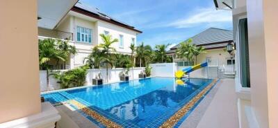 Outdoor swimming pool with surrounding buildings