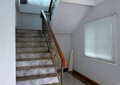 Elegant marble staircase in a bright hallway