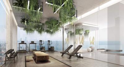 Modern gym with equipment and city view