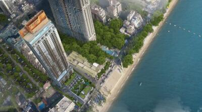 Aerial view of high-rise building next to the beach