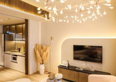 Modern living room with stylish chandelier and cozy seating area