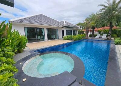 Backyard with swimming pool and outdoor seating