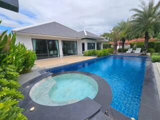 Backyard with swimming pool and outdoor seating