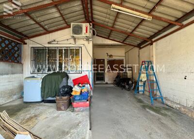 Interior view of a garage with various items and tools