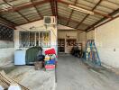 Interior view of a garage with various items and tools