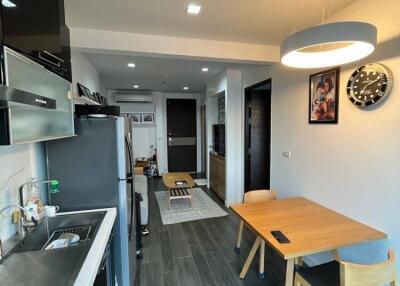 Modern kitchen with dining area and appliances