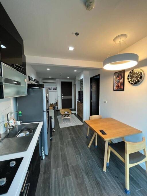 Modern kitchen with dining area and appliances