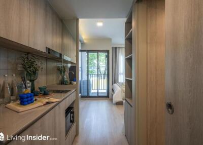 Modern kitchen with living area view