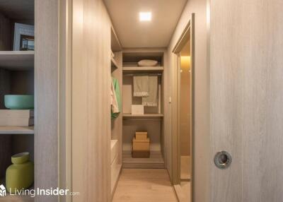 Well-organized walk-in closet with ample storage space