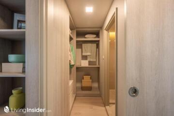 Well-organized walk-in closet with ample storage space