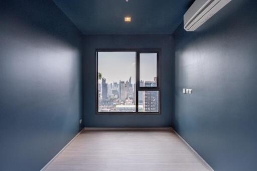 Empty room with a city view