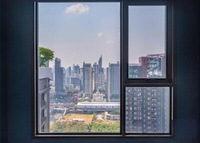 View of a city skyline through a window