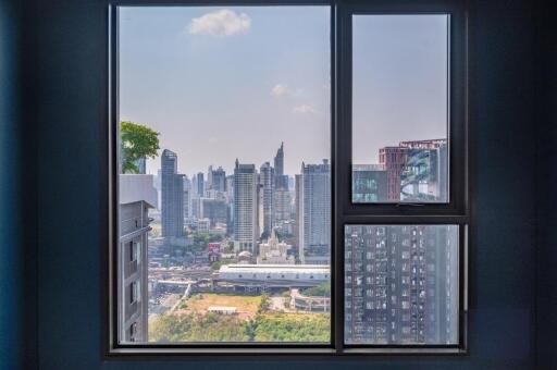 View of a city skyline through a window