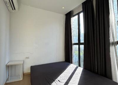 Bedroom with large windows and natural light