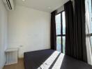 Bedroom with large windows and natural light