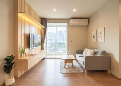 Modern living room with large window and city view