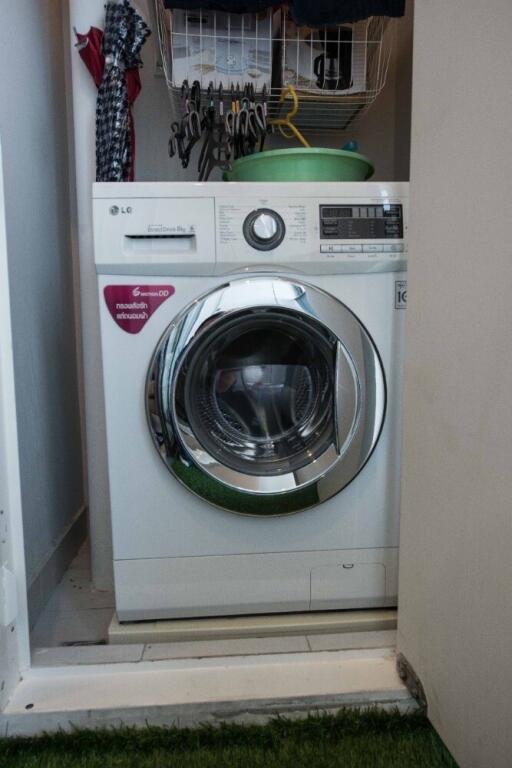 Compact laundry area with washing machine