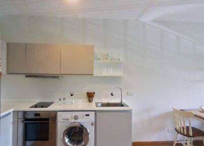 Modern kitchen with adjacent dining area