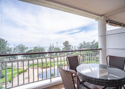 Balcony view with outdoor furniture and railing