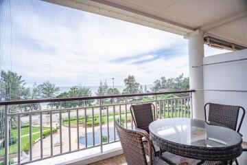 Balcony view with outdoor furniture and railing