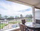 Balcony view with outdoor furniture and railing