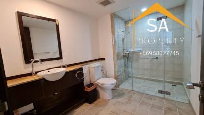 Modern bathroom with shower and vanity area