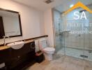 Modern bathroom with shower and vanity area