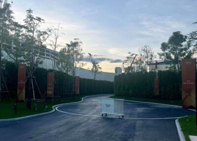 Entrance to the property with landscaping and clear sky