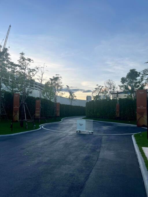 Entrance to the property with landscaping and clear sky