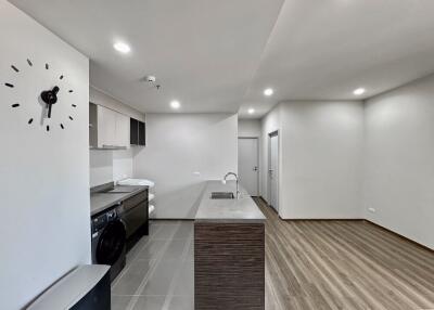 Modern kitchen with adjacent living space