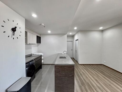 Modern kitchen with adjacent living space