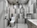 Modern bathroom with glass shower and tiled walls