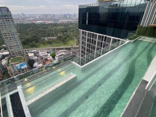 Rooftop pool with cityscape view