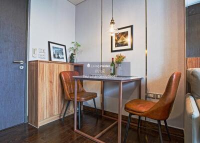 Cozy dining area with two chairs and a small table