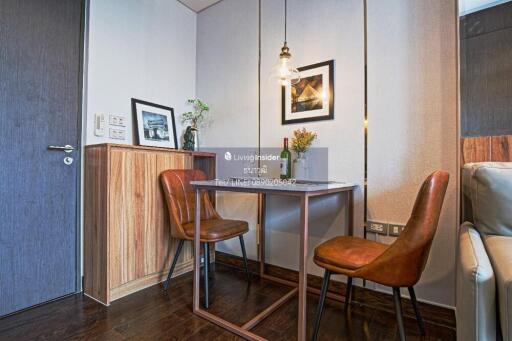 Cozy dining area with two chairs and a small table