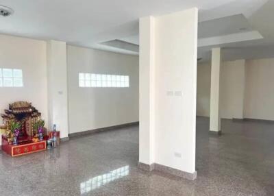 Spacious living room with polished floors