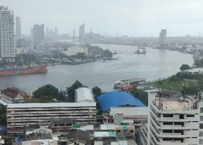 High-rise buildings along riverside, cityscape view