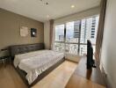 Modern bedroom with a large window view