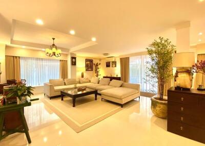 Spacious and well-lit living room with modern decor