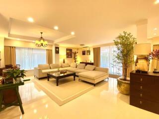 Spacious and well-lit living room with modern decor