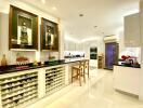 Modern kitchen with white cabinetry and wine storage