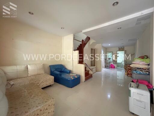 Modern living room with staircase and open layout