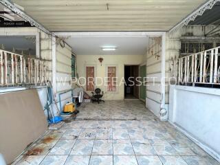 Garage or utility space with tiled floor