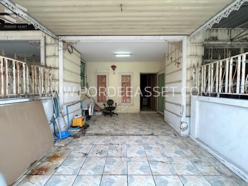 Garage or utility space with tiled floor