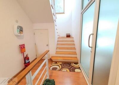 Entrance hallway leading to a staircase