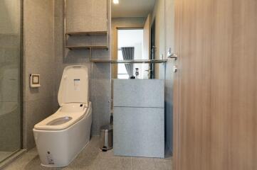 Modern bathroom with toilet and washbasin