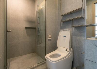 Modern bathroom with a shower and smart toilet